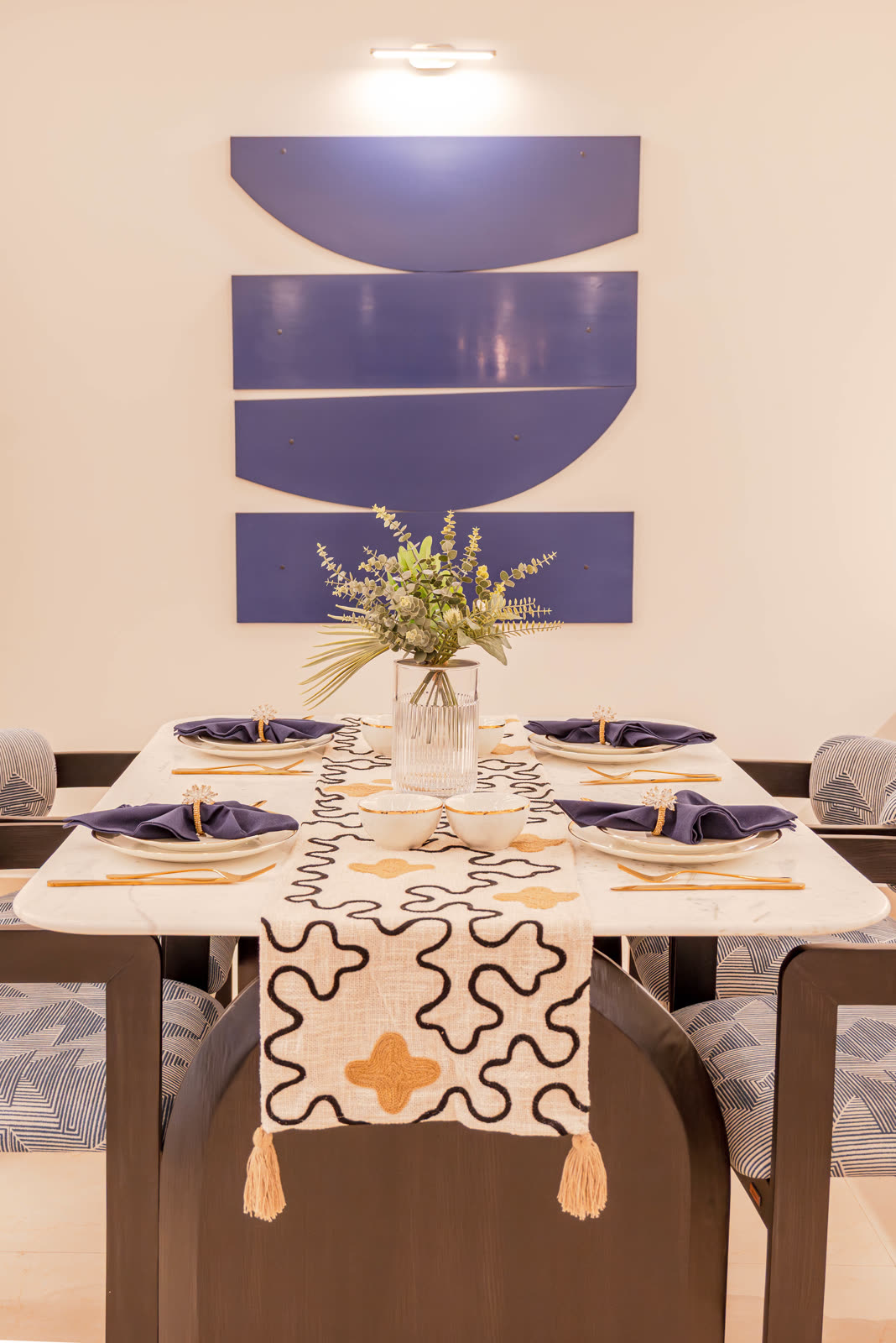 Beige Experience Centre — Dining Setups — Marble top · geometric backdrop