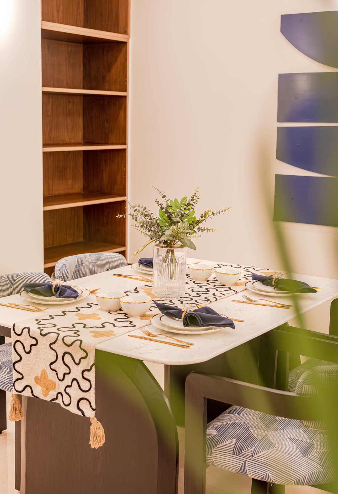 Beige Experience Centre — Dining Setups — Marble top · patterned runner