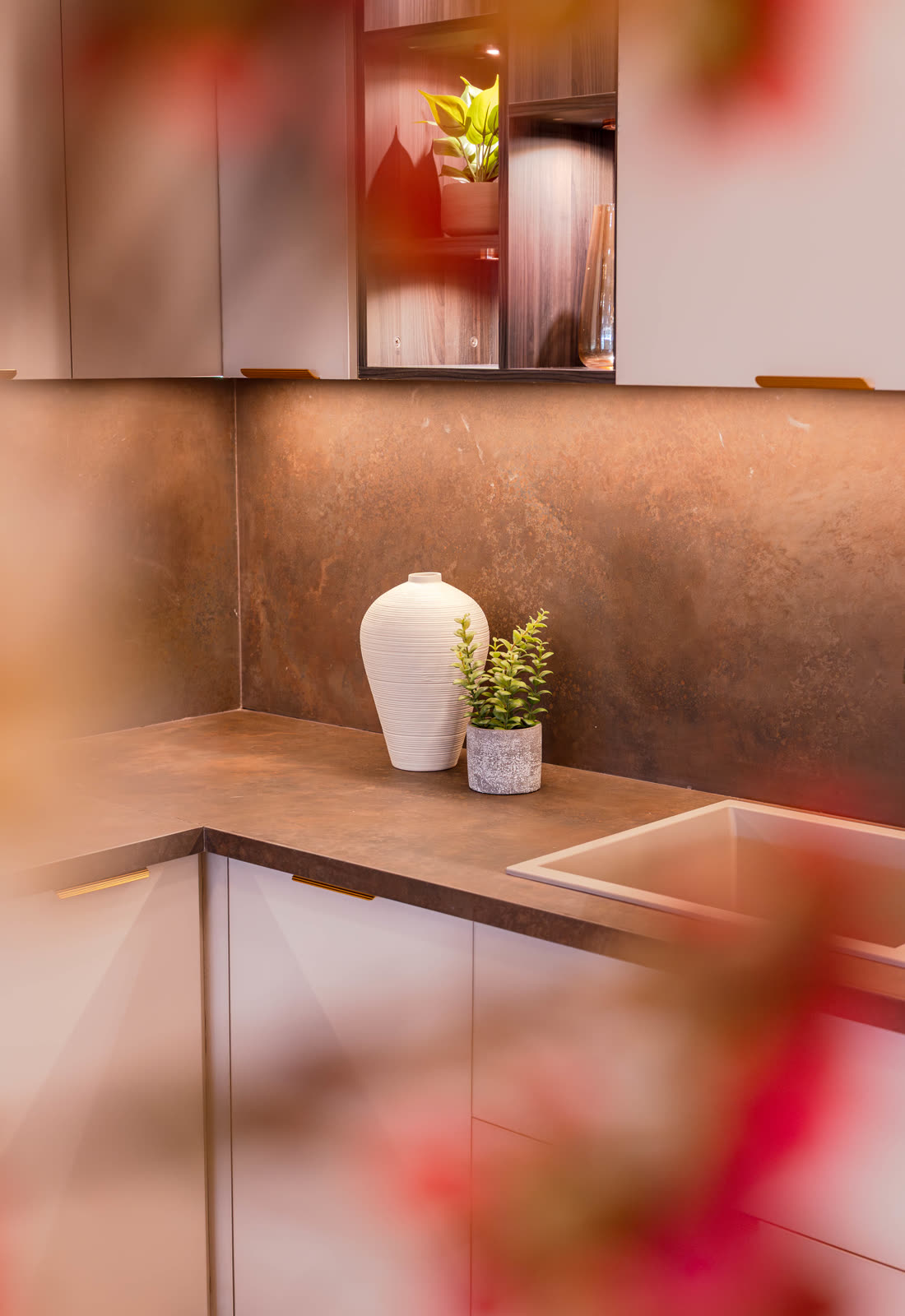 Beige Experience Centre — Modular Kitchen — White acrylic · flush recessed sink