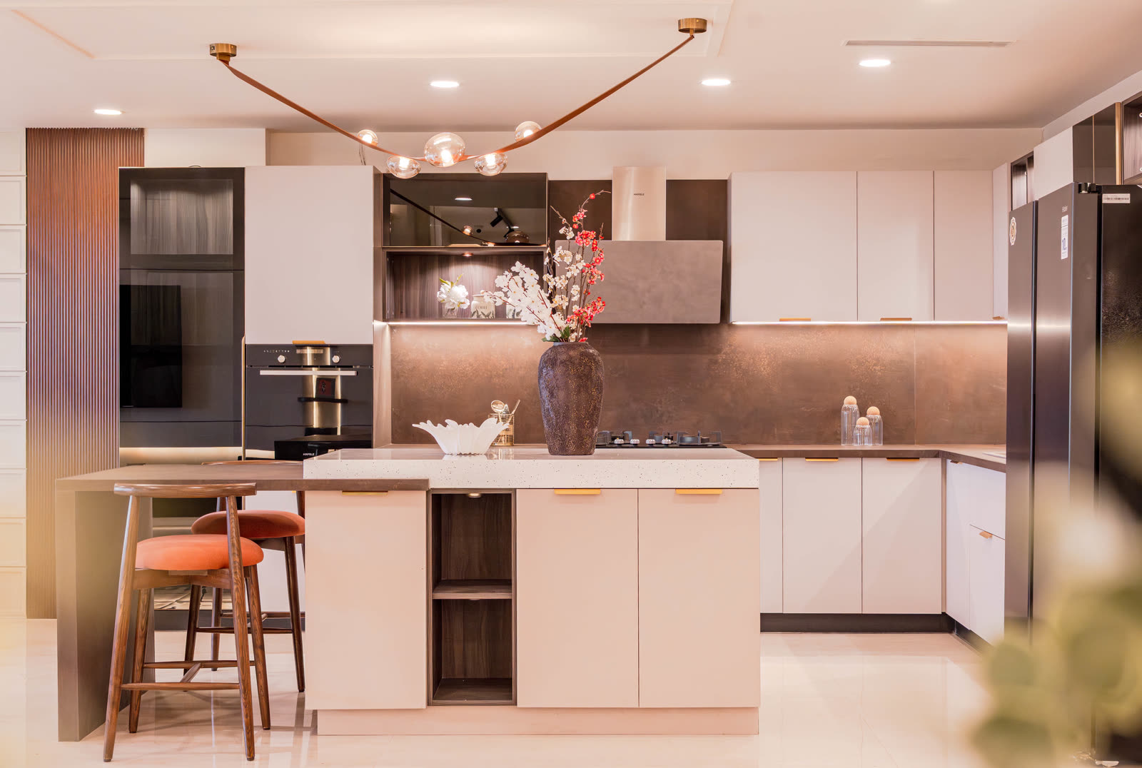 Beige Experience Centre — Modular Kitchen — Pink laminate · island layout