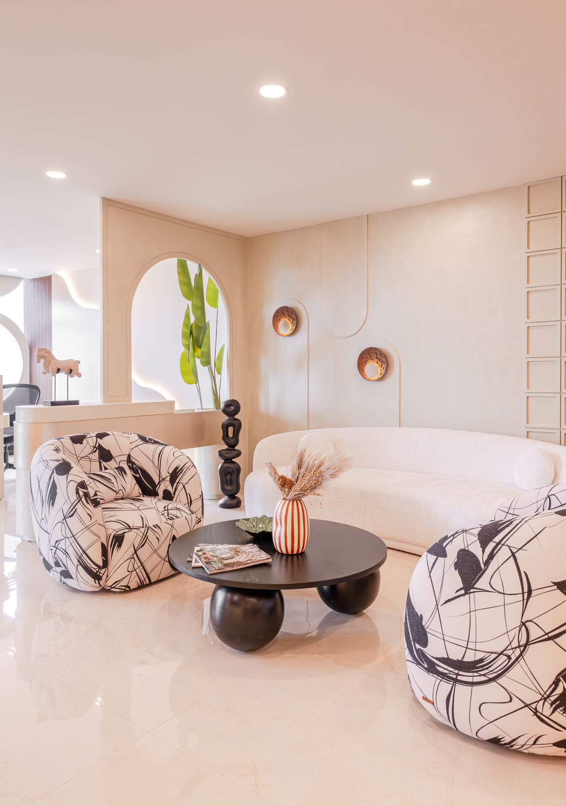 Beige Experience Centre — Sofa & Lounge — Arched niche · round coffee table