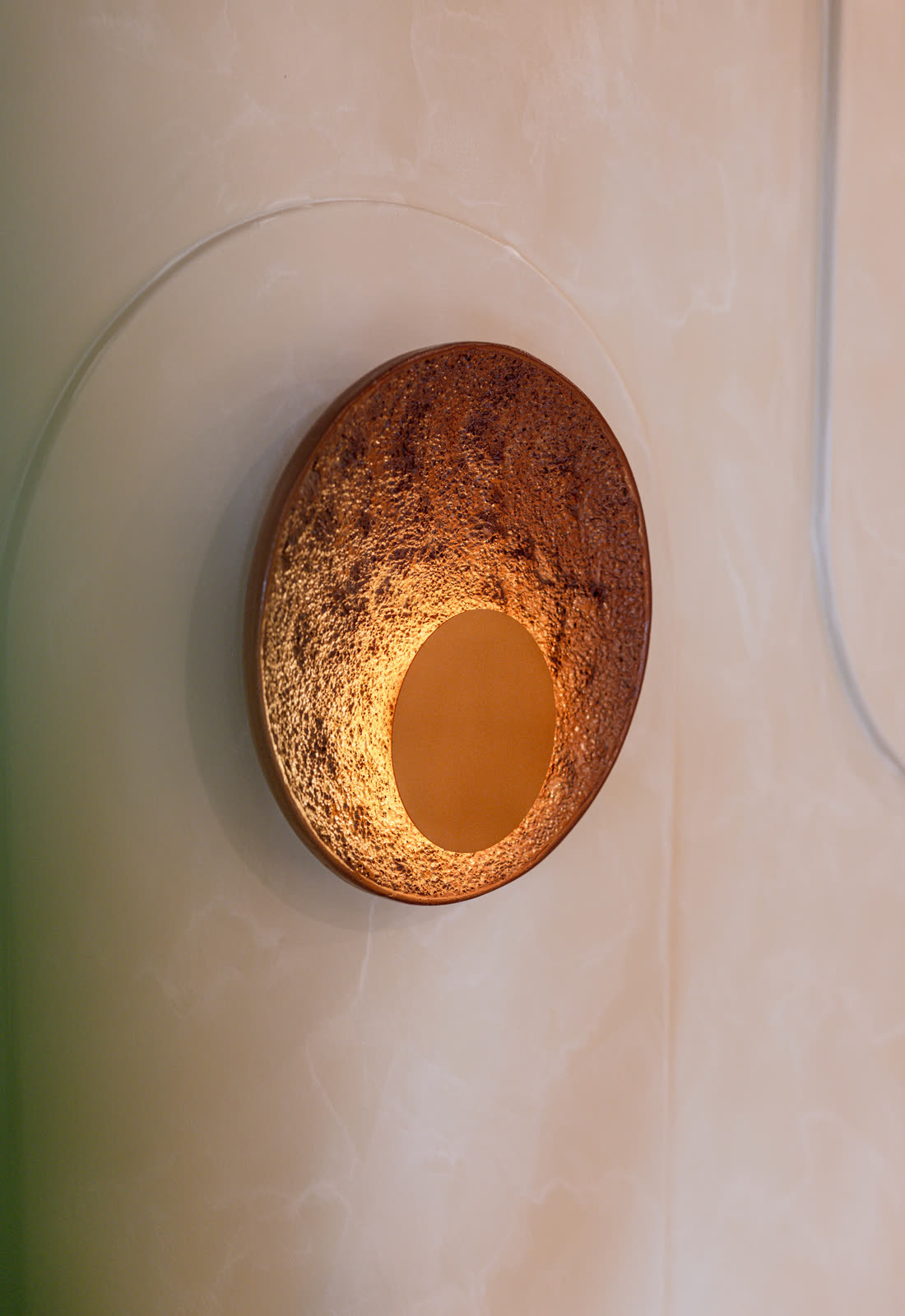 Beige Experience Centre — Pendant & Wall Light — Backlit textured sconce