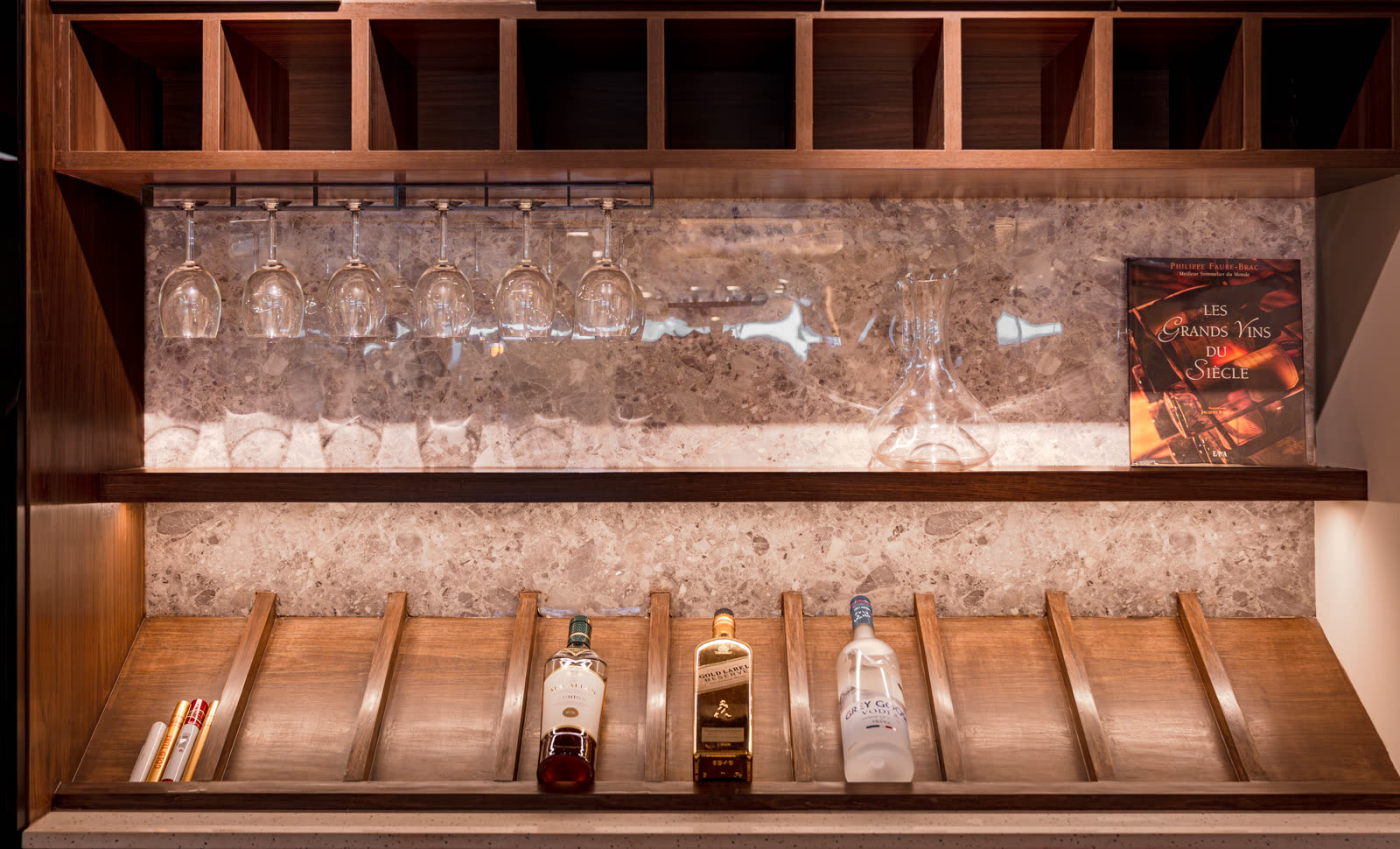 Beige Experience Centre — Bar Unit — Marble backsplash · wine rack