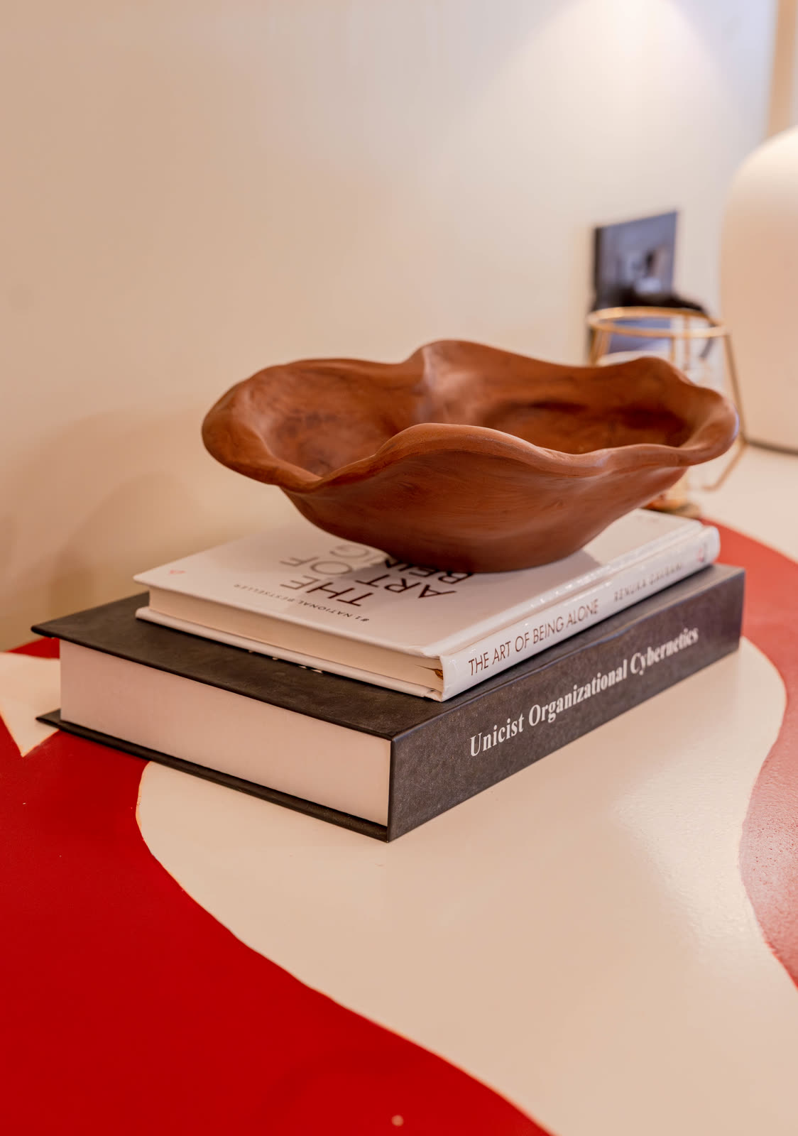 Beige Experience Centre — Accent Niche & Arch — Styled niche shelf · warm tones