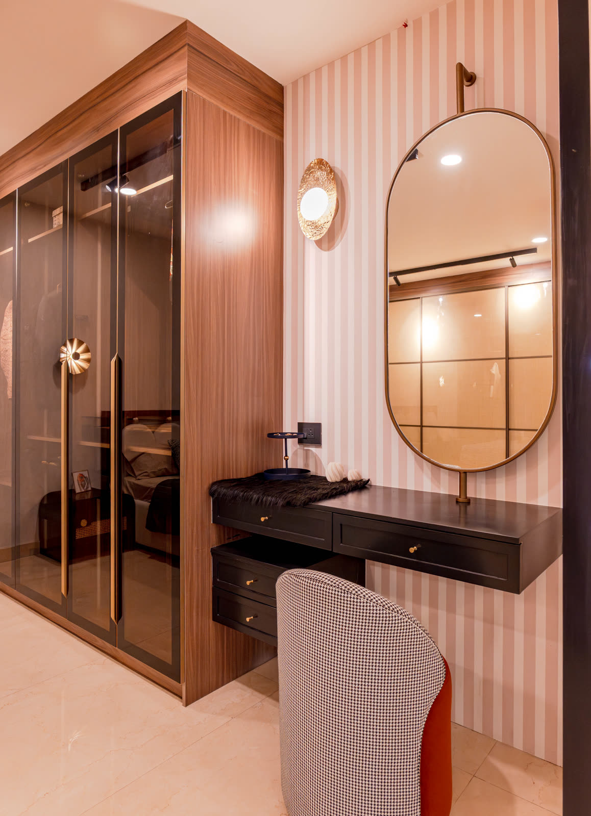 Beige Experience Centre — Dresser & Vanity — Black vanity · striped wallpaper