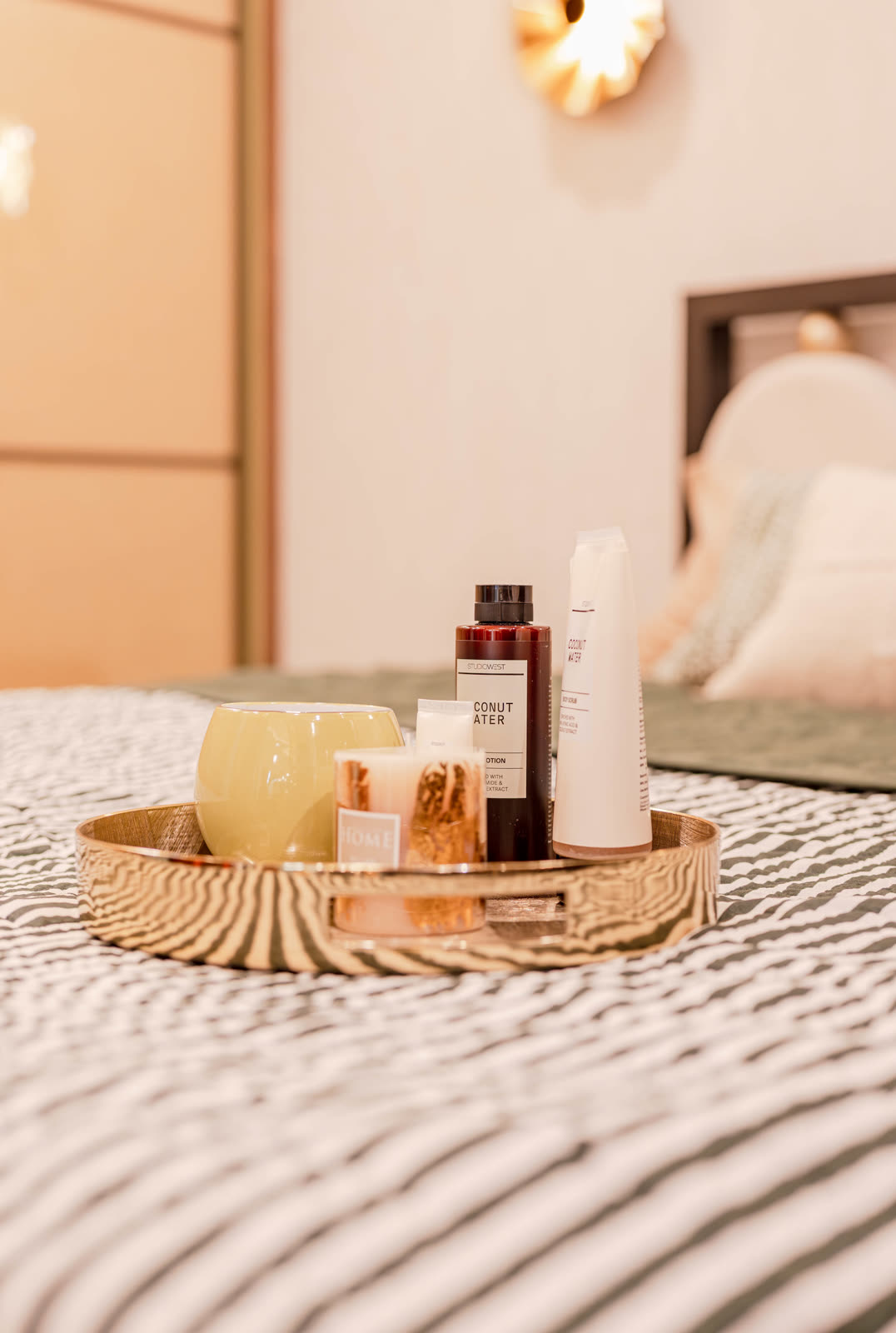 Beige Experience Centre — Master Bedroom — Bedside tray · candles · ceramics
